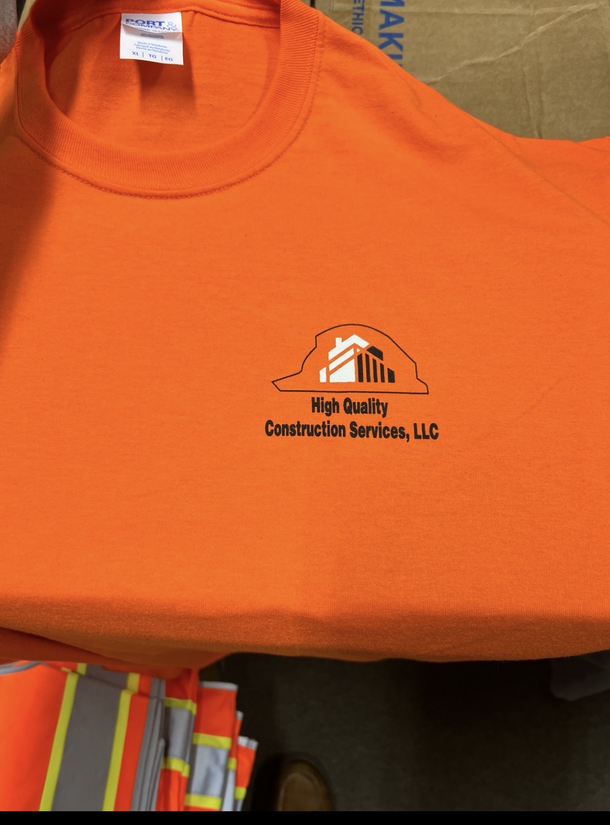 High Quality Construction Services branded work shirts