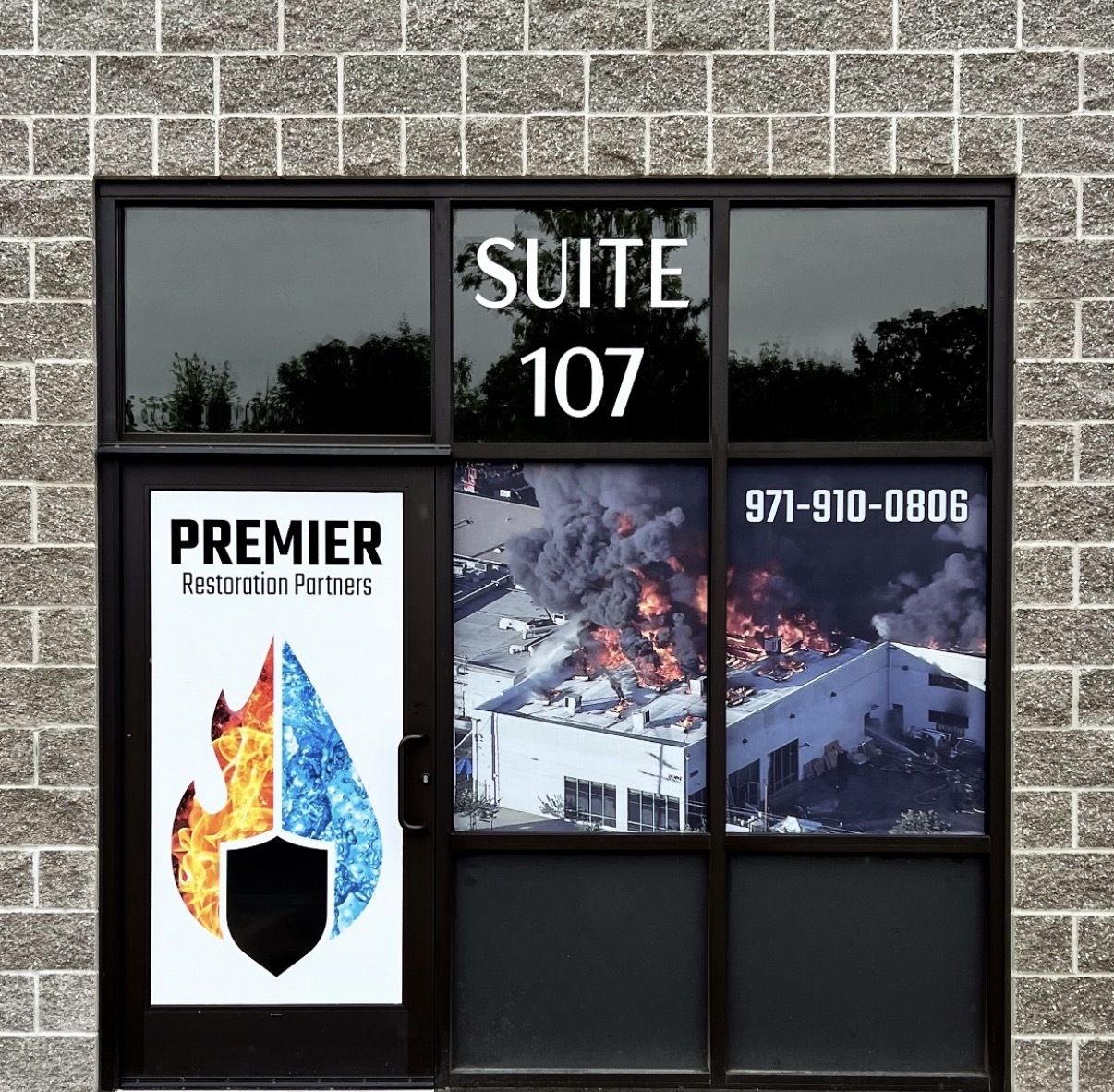 Premier Restoration Partners window graphics and suite lettering